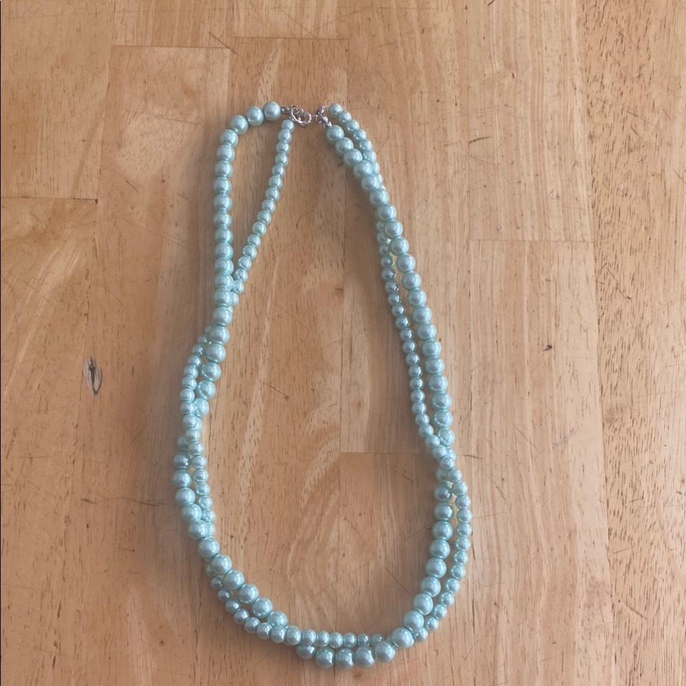 Elegant green round beaded Necklace on stretch cord w clasp about 20 inches.